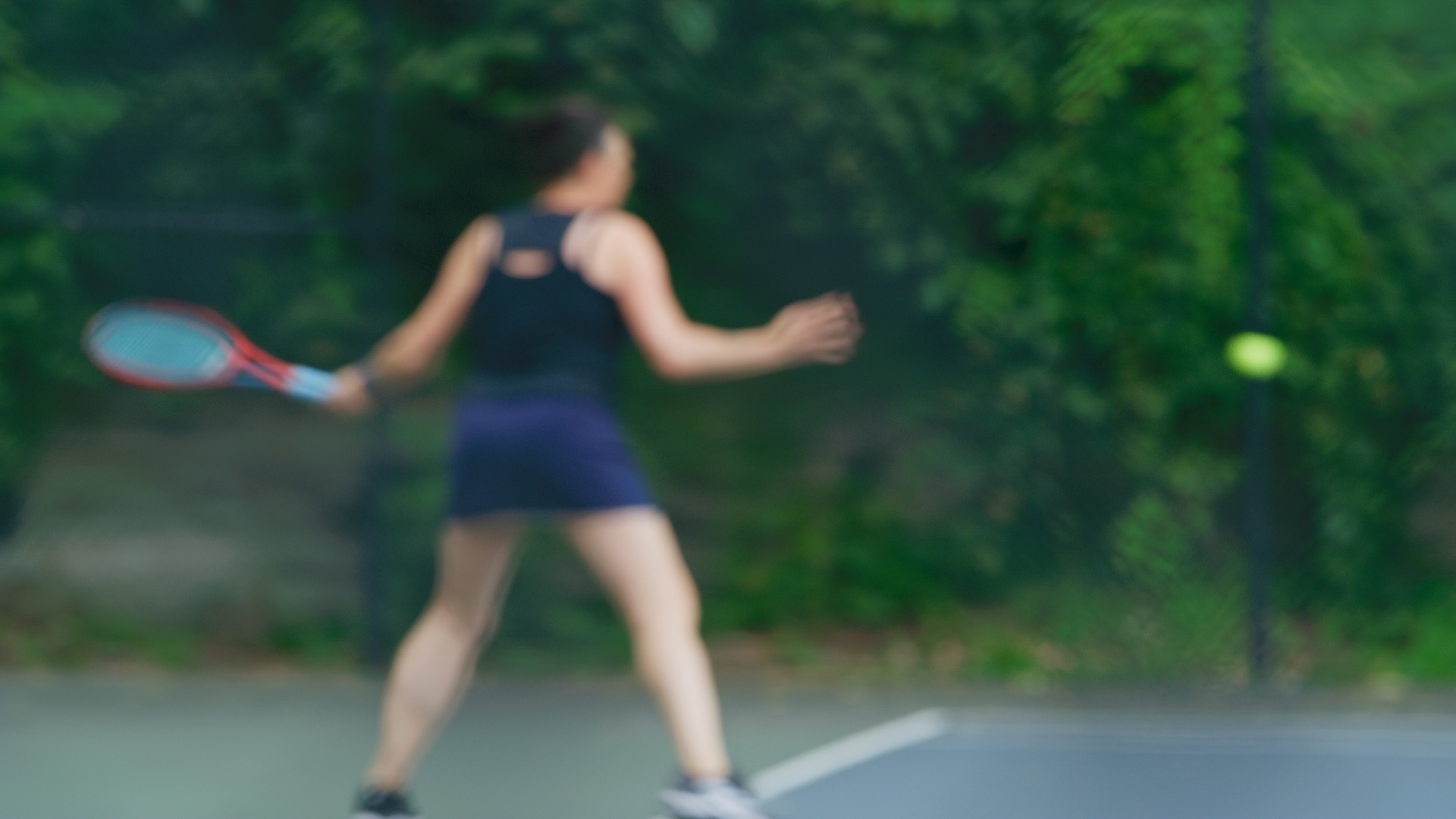 Player hitting a forehand at the Ulster County Open